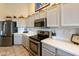 Well-equipped kitchen featuring stainless steel appliances at 4290 E Strawberry Dr, Gilbert, AZ 85298