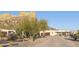 Curved driveway leading to a two-story home with mountain backdrop at 5117 N Cortez Rd, Apache Junction, AZ 85119