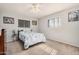 Bedroom with carpeted floors, neutral colored walls, and a ceiling fan at 5433 E Dodge St, Mesa, AZ 85205