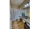Bathroom with granite countertop and striped shower curtain at 7605 S 18Th Way, Phoenix, AZ 85042
