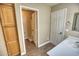 Bathroom with wooden cabinets and a toilet at 7605 S 18Th Way, Phoenix, AZ 85042
