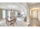 Open dining area with a wooden table and hardwood floors at 7605 S 18Th Way, Phoenix, AZ 85042