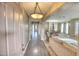Bright and spacious entryway with hardwood floors and chandelier at 7605 S 18Th Way, Phoenix, AZ 85042