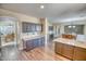 Spacious kitchen featuring granite countertops and dark wood cabinets at 7605 S 18Th Way, Phoenix, AZ 85042