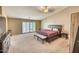 Large main bedroom with sliding doors to balcony at 7605 S 18Th Way, Phoenix, AZ 85042