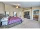 Main bedroom with large bed and ensuite bathroom access at 7605 S 18Th Way, Phoenix, AZ 85042