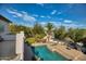 Elevated view of refreshing pool and well-maintained backyard at 7605 S 18Th Way, Phoenix, AZ 85042