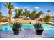 Stunning pool with tiered stone decking at 7605 S 18Th Way, Phoenix, AZ 85042