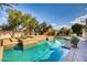 Relaxing pool and spa area with stone accents at 7605 S 18Th Way, Phoenix, AZ 85042