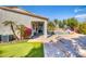 View of the pool and putting green from patio at 7605 S 18Th Way, Phoenix, AZ 85042