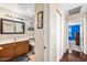 Bathroom with a vanity sink and hardwood floors at 8479 E Sunrise Sky Dr, Gold Canyon, AZ 85118