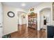 Inviting hallway with wood flooring and decorative arches at 8479 E Sunrise Sky Dr, Gold Canyon, AZ 85118