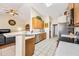Bright kitchen featuring stainless steel appliances and breakfast bar at 8479 E Sunrise Sky Dr, Gold Canyon, AZ 85118