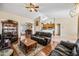 Spacious living room with dark leather furniture and stylish decor at 8479 E Sunrise Sky Dr, Gold Canyon, AZ 85118