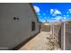 View of the side yard with privacy fence, showing extra storage space; mountain views visible at 8479 E Sunrise Sky Dr, Gold Canyon, AZ 85118