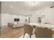Comfortable open floor plan featuring tile floors, dining area, and living space with modern decor at 9270 E Mission Ln # 117, Scottsdale, AZ 85258