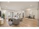 Stylish living room with modern furniture, tile floors, and an open layout for easy entertaining at 9270 E Mission Ln # 117, Scottsdale, AZ 85258