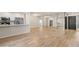Spacious living area with quartz breakfast bar, tile floors, and mirrored walls, perfect for modern living at 9270 E Mission Ln # 117, Scottsdale, AZ 85258