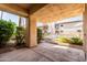Covered patio offering views of the community pool and landscaping at 9270 E Mission Ln # 117, Scottsdale, AZ 85258