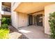 A cozy covered patio with exterior access at 9270 E Mission Ln # 117, Scottsdale, AZ 85258