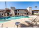 Inviting community pool with plenty of lounge seating, perfect for relaxation and socializing at 9270 E Mission Ln # 117, Scottsdale, AZ 85258