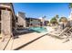 Community pool with lounge chairs and well-maintained grounds offers a refreshing outdoor retreat at 9270 E Mission Ln # 117, Scottsdale, AZ 85258