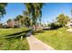 Manicured lawns and beautiful tennis courts enhance the outdoor experience of this community at 9270 E Mission Ln # 117, Scottsdale, AZ 85258