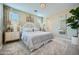 Main bedroom with a white bed frame and gray carpeting at 10156 E Ursula Ave, Mesa, AZ 85212