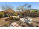 Backyard with gravel landscaping, desert plants, and an outdoor seating area at 10306 E Rising Sun Pl, Gold Canyon, AZ 85118