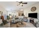 Spacious open-concept living room flowing into the kitchen and dining areas at 10306 E Rising Sun Pl, Gold Canyon, AZ 85118