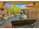 Private balcony overlooking the community courtyard and trees at 10330 W Thunderbird Blvd # A321, Sun City, AZ 85351