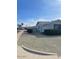 Side view of the house showing a neatly landscaped yard at 10365 W Pinehurst Dr, Sun City, AZ 85351