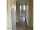 Clean hallway with tile floors at 10365 W Pinehurst Dr, Sun City, AZ 85351