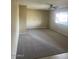 Spacious living room with neutral colored walls and carpeted floor at 10365 W Pinehurst Dr, Sun City, AZ 85351