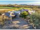 Aerial view of home and surrounding landscape at 10531 E Fernwood Ln, Scottsdale, AZ 85262