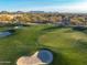 Golf course aerial view with sand traps at 10531 E Fernwood Ln, Scottsdale, AZ 85262