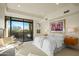 Spacious bedroom with large windows and patio access at 10531 E Fernwood Ln, Scottsdale, AZ 85262