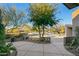 Landscaped courtyard with a walkway and desert plants at 10531 E Fernwood Ln, Scottsdale, AZ 85262