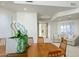 Modern dining room with seating area and hardwood floors at 10531 E Fernwood Ln, Scottsdale, AZ 85262