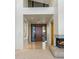 Spacious entryway with a fireplace and modern design at 10531 E Fernwood Ln, Scottsdale, AZ 85262