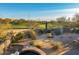 Landscaped yard with golf course view at 10531 E Fernwood Ln, Scottsdale, AZ 85262