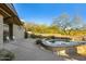 Inviting kidney shaped pool with patio seating at 10531 E Fernwood Ln, Scottsdale, AZ 85262