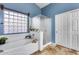 Spa-like bathroom with a large soaking tub, a separate shower, and a skylight at 11259 W Harrison St, Avondale, AZ 85323