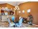 Casual dining area with glass table and kitchen access at 11259 W Harrison St, Avondale, AZ 85323