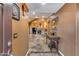 Bright entryway with tiled floors, a fireplace, and a console table at 11259 W Harrison St, Avondale, AZ 85323