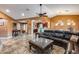 Open concept living room with kitchen and entry views at 11259 W Harrison St, Avondale, AZ 85323