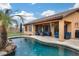 Relaxing pool area with patio furniture and covered seating area at 11259 W Harrison St, Avondale, AZ 85323