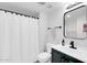 Bathroom featuring white shower curtain, modern vanity, and updated fixtures at 1245 E Avenida Hermosa --, Phoenix, AZ 85014