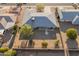 Aerial view of a ranch house with backyard patio and surrounding desert landscaping at 12734 W Crystal Lake Dr, Sun City West, AZ 85375