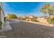 View of backyard with gravel landscaping and seating at 12734 W Crystal Lake Dr, Sun City West, AZ 85375